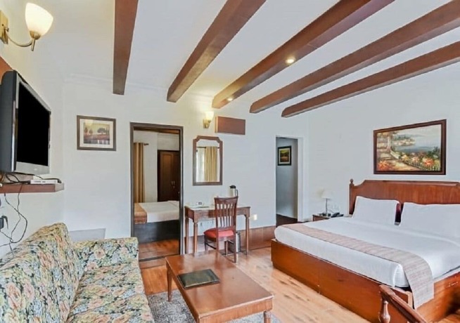 Imagen de la habitación del Hotel Manu Maharani Regency. Foto 18