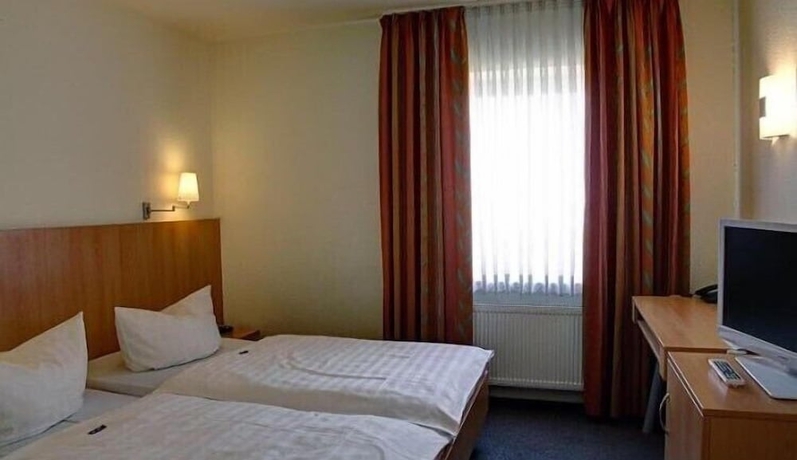 Imagen de la habitación del Hotel Manu, Paderborn. Foto 9