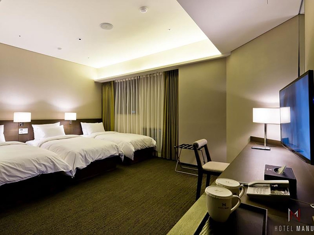 Imagen de los exteriores del Hotel Manu, Seul. Foto 12