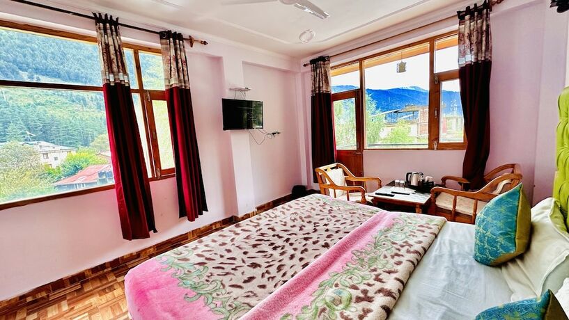 Imagen de la habitación del Hotel Manu Vatika Manali. Foto 15