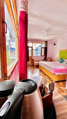 Imagen de la habitación del Hotel Manu Vatika Manali. Foto 20