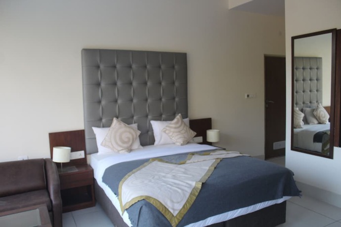 Imagen de la habitación del Hotel Manuni Inn - Riverside. Foto 18