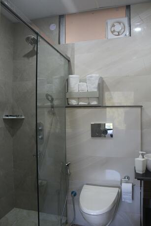 Imagen de la habitación del Hotel Manuni Inn - Riverside. Foto 20