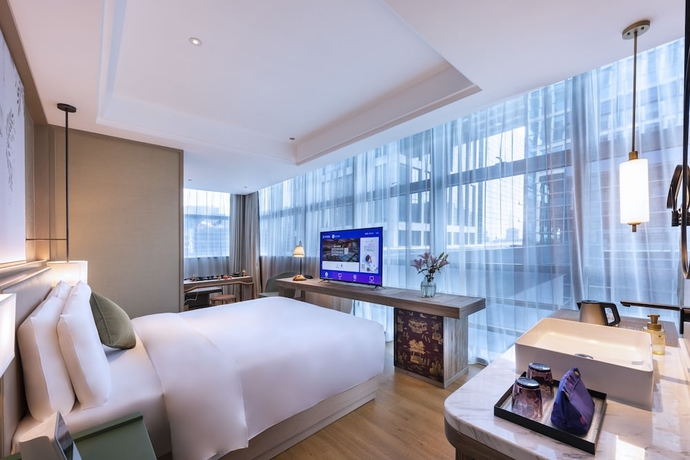 Imagen de la habitación del Hotel Manxin Beijing Bei Qi Jia Wen Du Shui Cheng. Foto 5