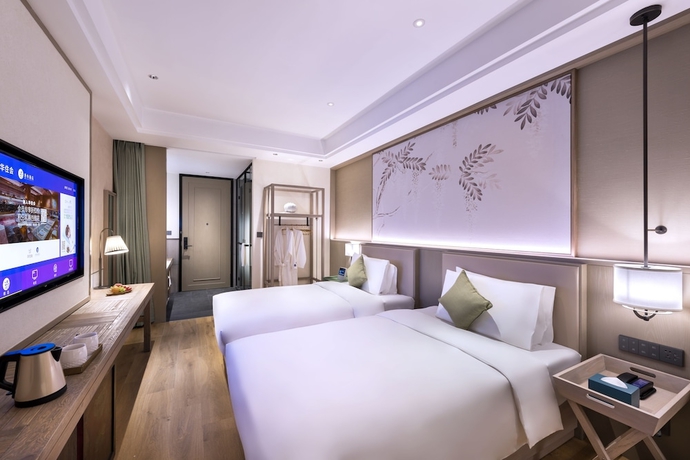 Imagen de la habitación del Hotel Manxin Beijing Bei Qi Jia Wen Du Shui Cheng. Foto 10