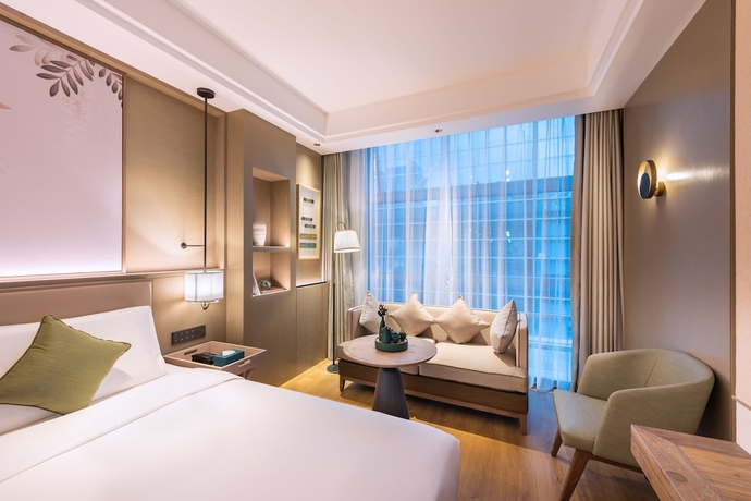 Imagen de la habitación del Hotel Manxin Beijing Bei Qi Jia Wen Du Shui Cheng. Foto 13