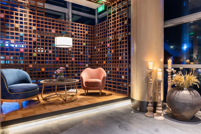 Imagen del bar/restaurante del Hotel Manxin Beijing Bei Qi Jia Wen Du Shui Cheng. Foto 3