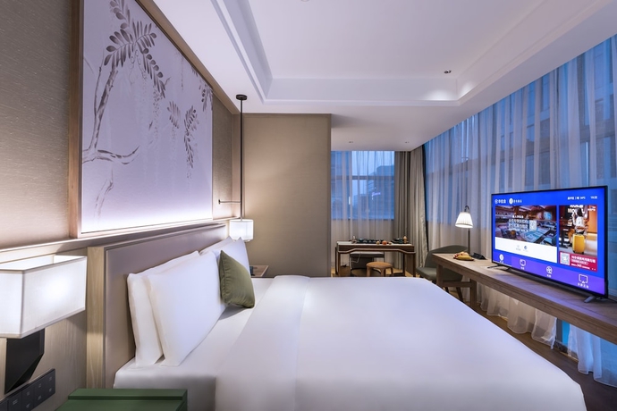 Imagen de la habitación del Hotel Manxin Beijing Bei Qi Jia Wen Du Shui Cheng. Foto 14