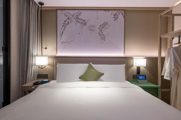 Imagen de la habitación del Hotel Manxin Beijing Bei Qi Jia Wen Du Shui Cheng. Foto 17