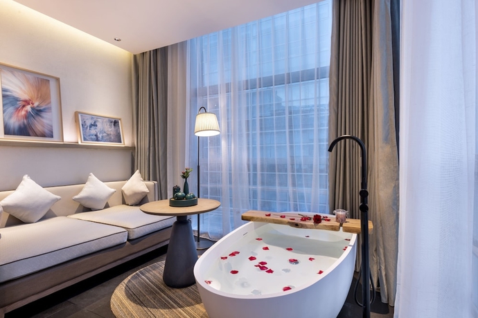 Imagen de la habitación del Hotel Manxin Beijing Bei Qi Jia Wen Du Shui Cheng. Foto 18