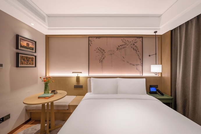 Imagen de la habitación del Hotel Manxin. Foto 4