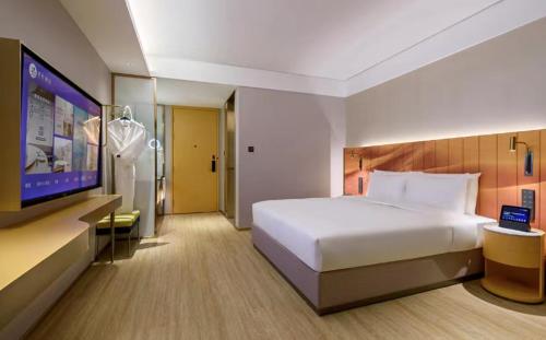 Imagen de la habitación del Hotel Manxin Guangzhou Baiyun Airport Branch. Foto 14