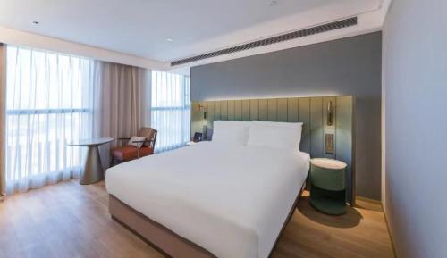 Imagen general del Hotel Manxin Guangzhou Baiyun Airport Branch. Foto 6