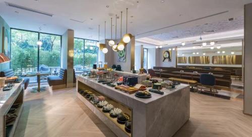Imagen general del Hotel Manxin Guangzhou Baiyun Airport Branch. Foto 11