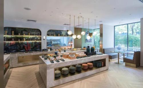 Imagen general del Hotel Manxin Guangzhou Baiyun Airport Branch. Foto 12