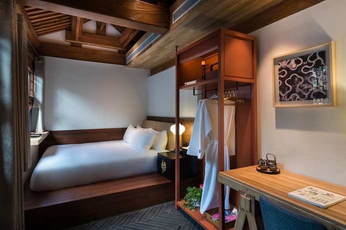 Imagen de la habitación del Hotel Manxin Qianmen Courtyard. Foto 2