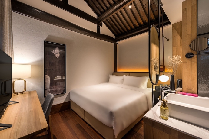 Imagen de la habitación del Hotel Manxin Qianmen Courtyard. Foto 8