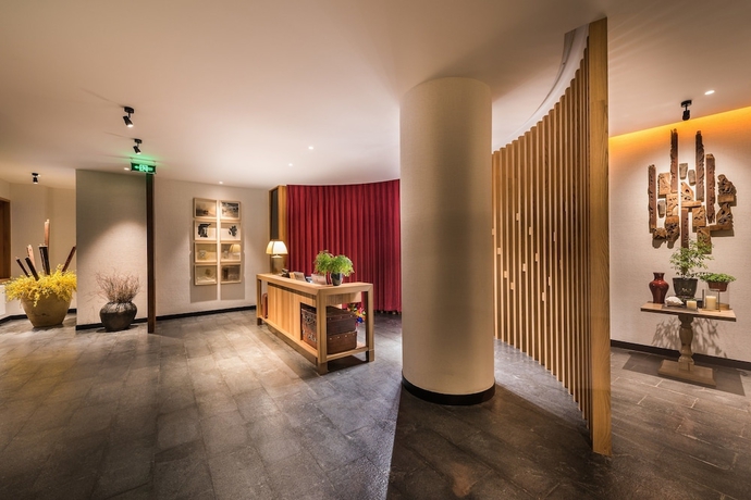 Imagen de los interiores del Hotel Manxin Qianmen Courtyard. Foto 18