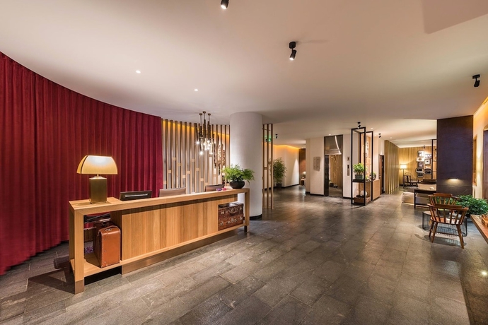Imagen de los interiores del Hotel Manxin Qianmen Courtyard. Foto 19