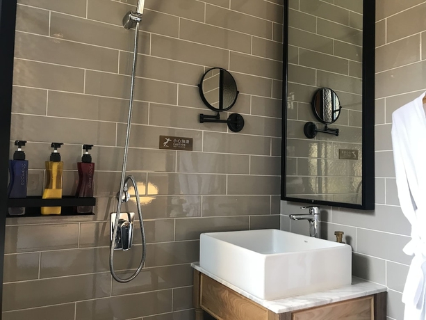 Imagen de la habitación del Hotel Manxin Qianmen Courtyard. Foto 14