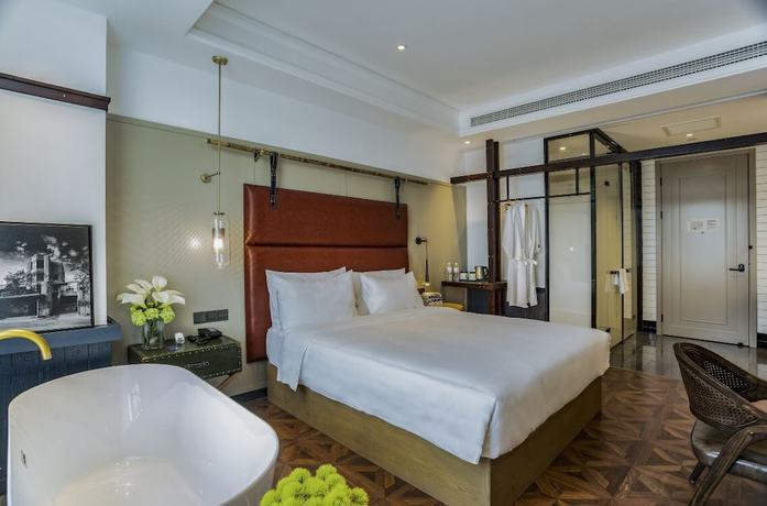 Imagen de la habitación del Hotel Manxin Qingdao Zhanqiao. Foto 2
