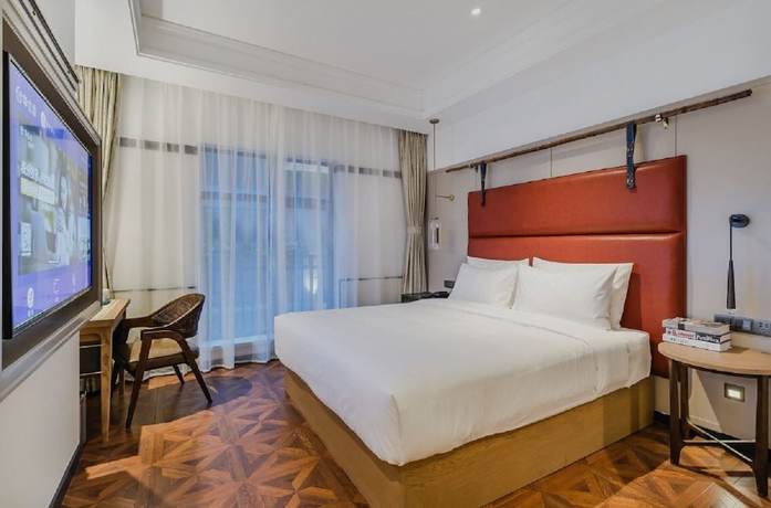 Imagen de la habitación del Hotel Manxin Qingdao Zhanqiao. Foto 3