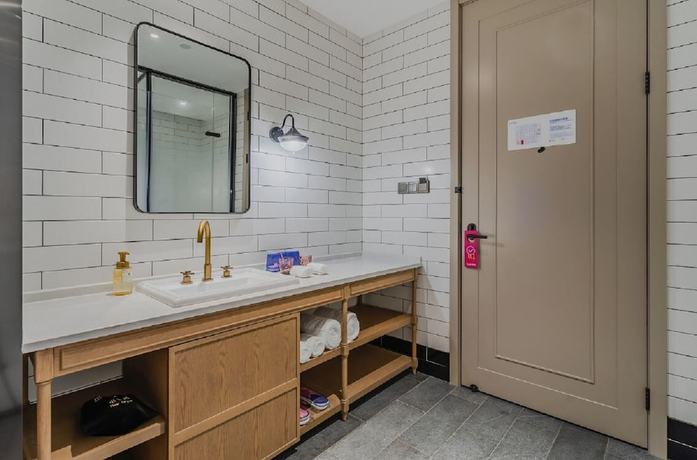 Imagen de la habitación del Hotel Manxin Qingdao Zhanqiao. Foto 5