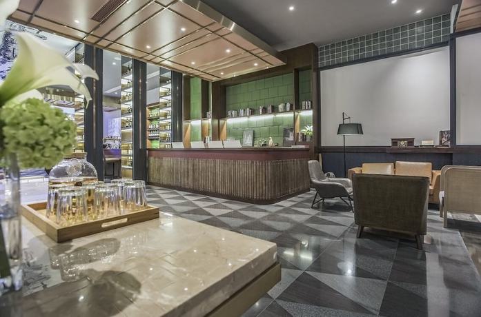Imagen de los interiores del Hotel Manxin Qingdao Zhanqiao. Foto 20