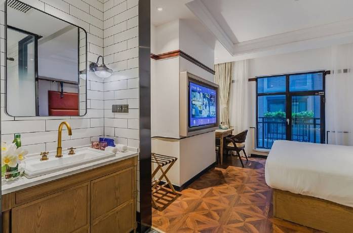 Imagen de la habitación del Hotel Manxin Qingdao Zhanqiao. Foto 6