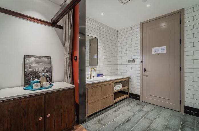 Imagen de la habitación del Hotel Manxin Qingdao Zhanqiao. Foto 7