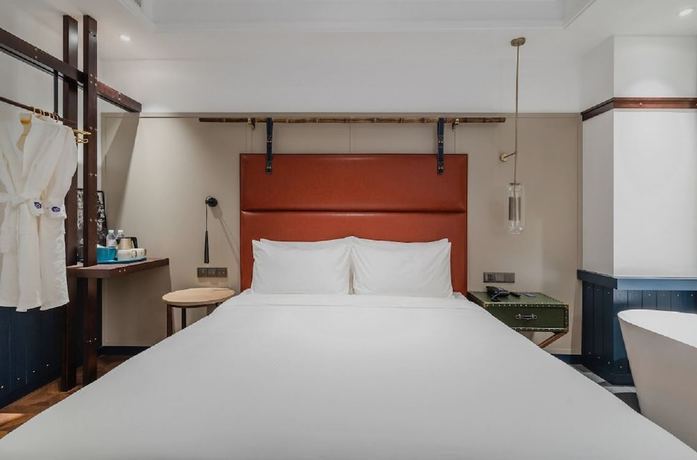 Imagen de la habitación del Hotel Manxin Qingdao Zhanqiao. Foto 9