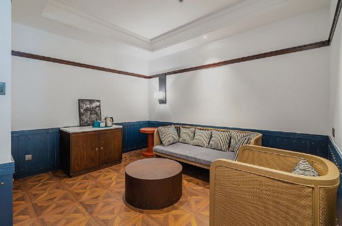Imagen de la habitación del Hotel Manxin Qingdao Zhanqiao. Foto 17