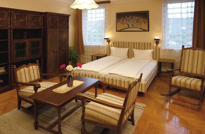 Imagen de la habitación del Hotel Manzard Panzio. Foto 11