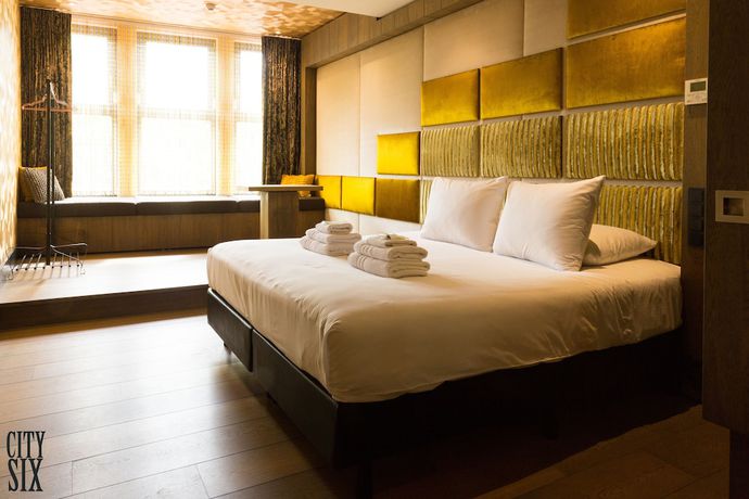 Imagen de la habitación del Hotel Manzo's Suites. Foto 7