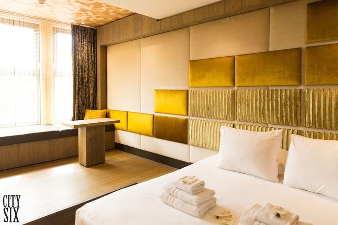 Imagen de la habitación del Hotel Manzo's Suites. Foto 11