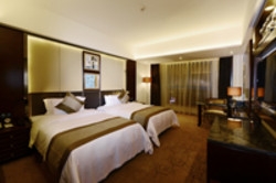 Imagen de la habitación del Hotel Maoming International. Foto 5
