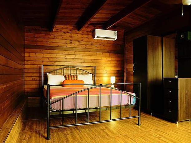 Imagen de la habitación del Hotel Maoya Retreat. Foto 11