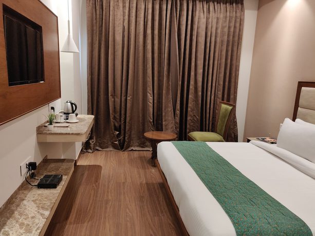 Imagen de la habitación del Hotel Maple Grand, Agra. Foto 9