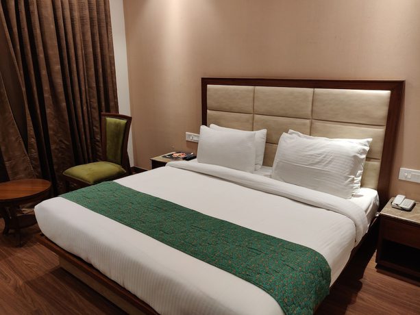 Imagen de la habitación del Hotel Maple Grand, Agra. Foto 11