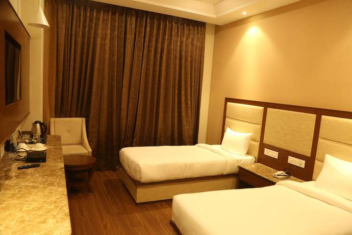 Imagen de la habitación del Hotel Maple Grand, Agra. Foto 14
