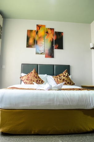 Imagen de la habitación del Hotel Maple Inn. Foto 4