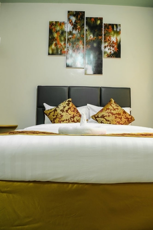 Imagen de la habitación del Hotel Maple Inn. Foto 5