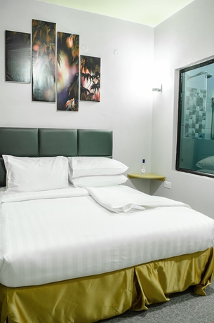 Imagen de la habitación del Hotel Maple Inn. Foto 16