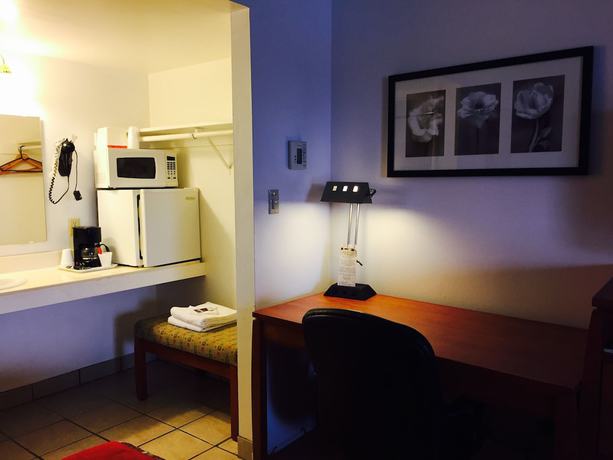Imagen de la habitación del Hotel Maple Inn and Suites. Foto 11