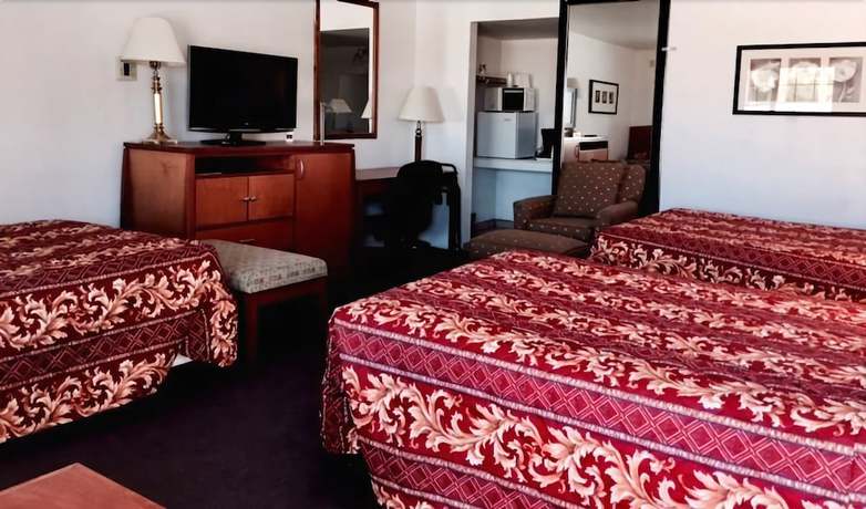 Imagen de la habitación del Hotel Maple Inn and Suites. Foto 12