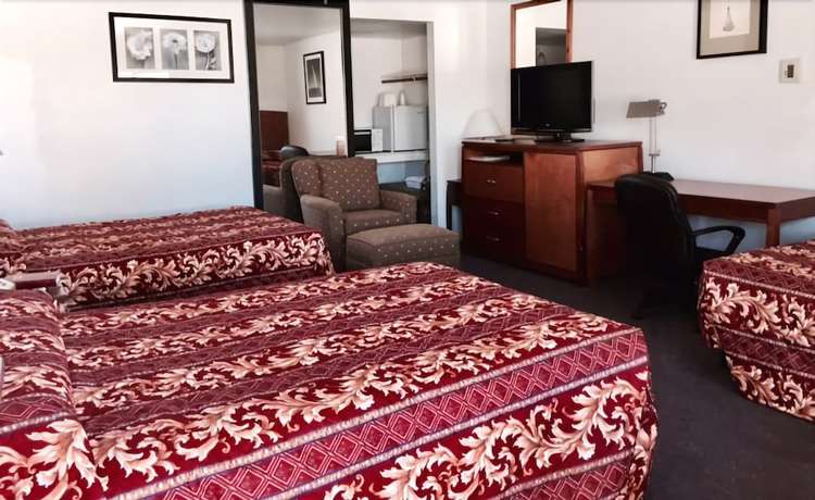 Imagen de la habitación del Hotel Maple Inn and Suites. Foto 16