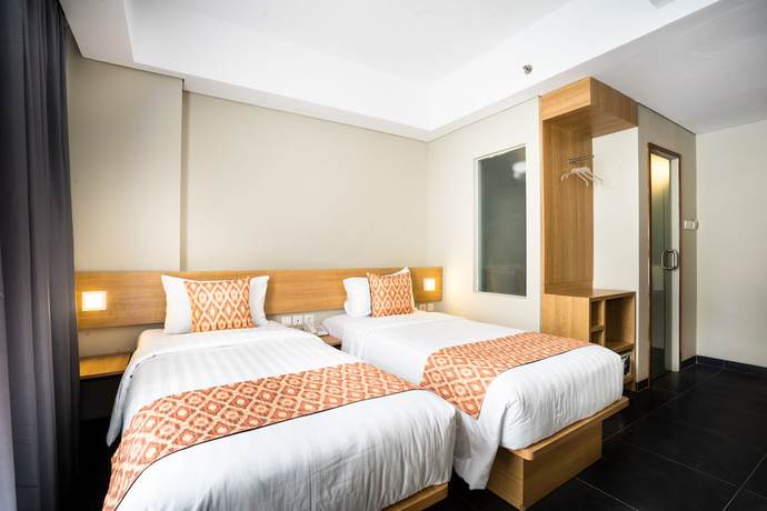 Imagen de la habitación del Hotel Maple Jakarta. Foto 12