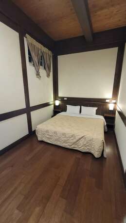 Imagen de la habitación del Hotel Maple Leaf Holiday Villa. Foto 15