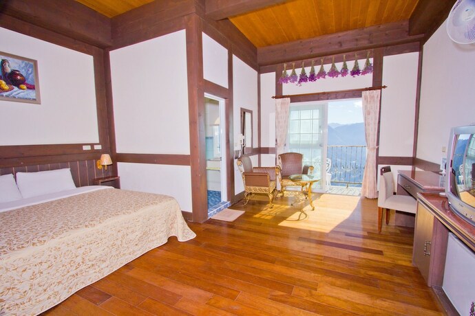 Imagen de la habitación del Hotel Maple Leaf Holiday Villa. Foto 16