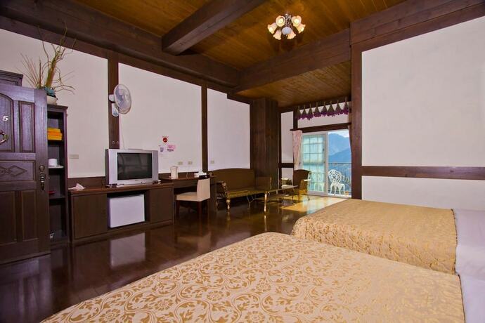 Imagen de la habitación del Hotel Maple Leaf Holiday Villa. Foto 18